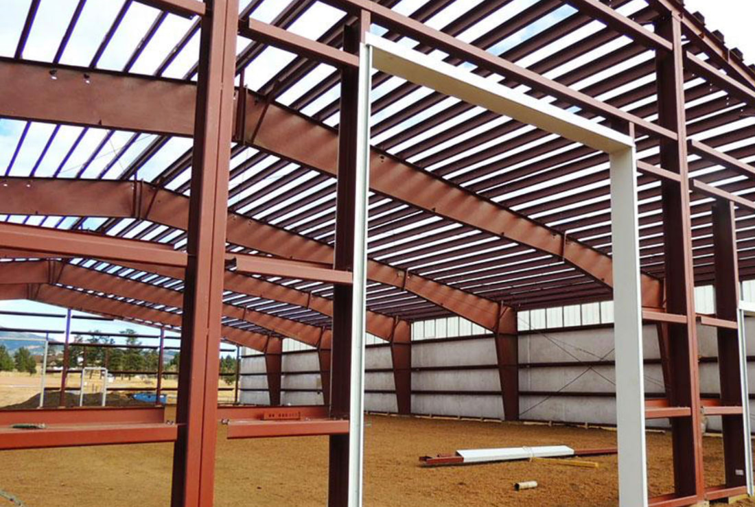 Interior of a red-steel industrial building frame