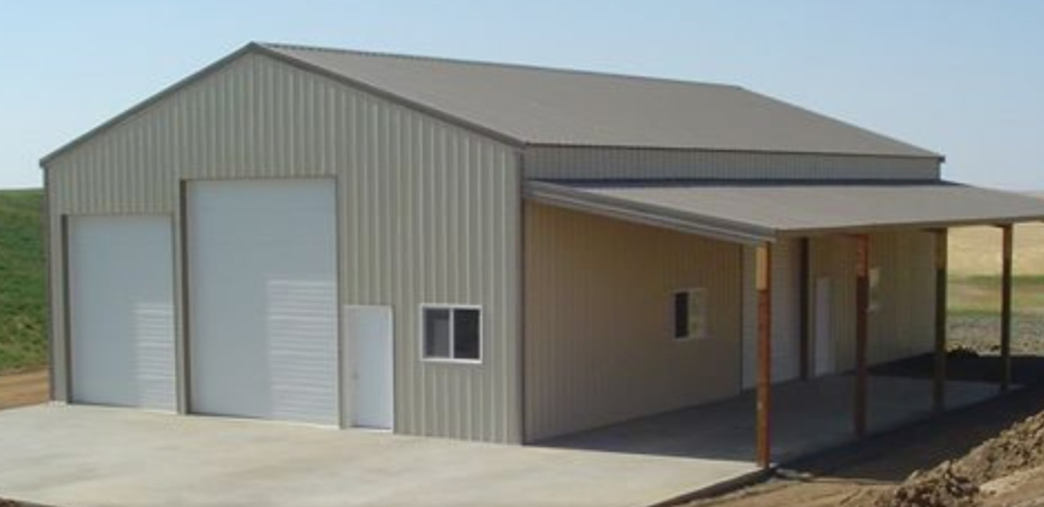 Steel post-frame agricultural shop with lean-to